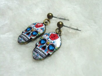 Boucles d'oreilles originales crane mexicain diamants