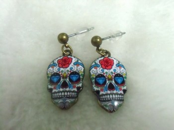 Boucles d'oreilles originales crane mexicain diamants