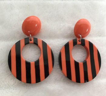 Boucles d'oreilles rétro rondes en résine orange et noire à rayures