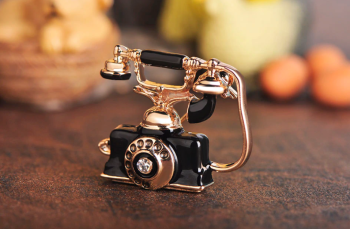 broche-telephone-vintage-noir-dore