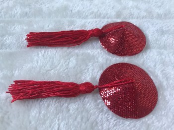 Cache-tétons nippies rouges brillants pompons rouges