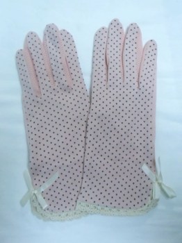 Gants courts rose tissu à pois noeuds aux poignets