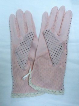 Gants courts rose tissu à pois noeuds aux poignets