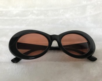 Lunettes de soleil rétro années 60 ovales noires