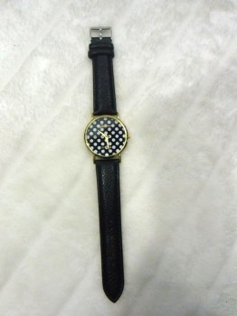 Montre fantaisie originale noire à pois blancs