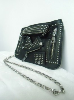 Pochette rockabilly veste perfecto noire clous simili cuir